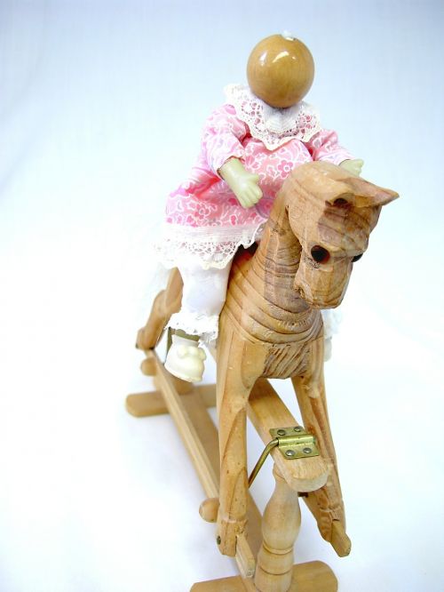 wooden horse rocking horse doll