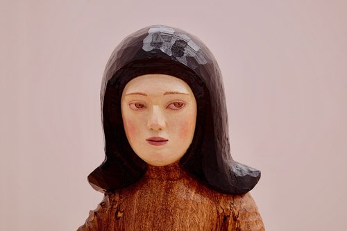 wooden statue  woman  face