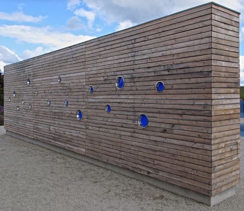 wooden wall artwork exhibition