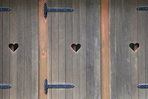wooden windows  hearts  cabin