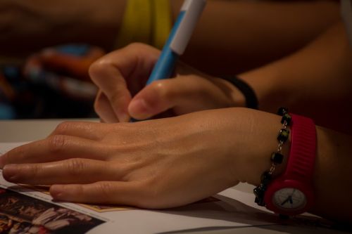 writing hands girl