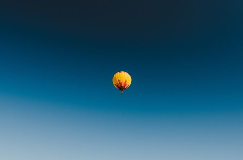 yellow hot air balloon blue