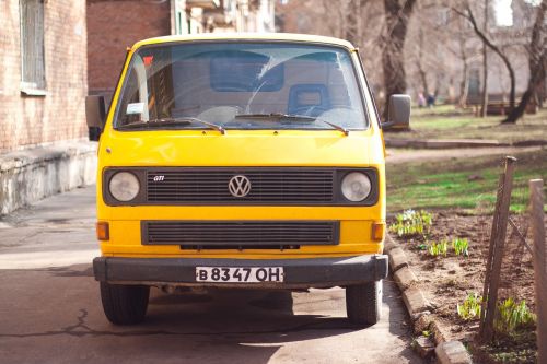 yellow vehicle travel