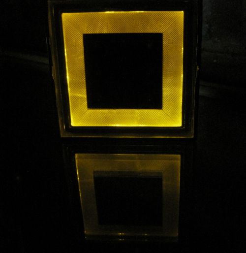 Yellow Solar Light And Reflection