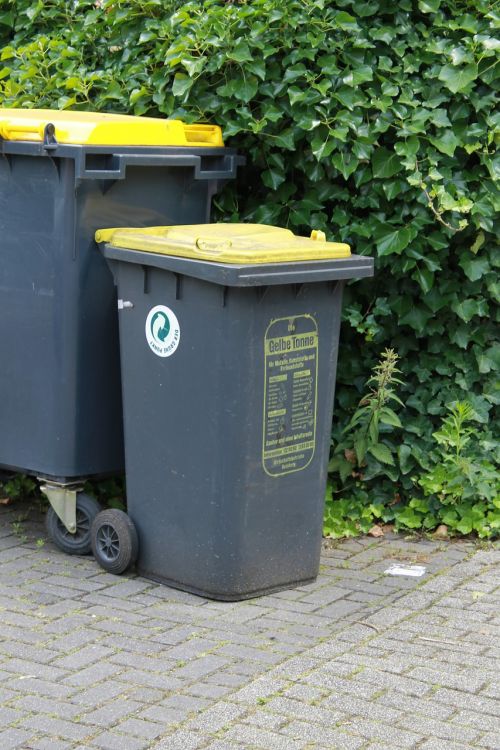 yellow ton garbage can waste