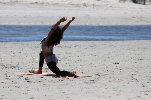 yoga woman beach
