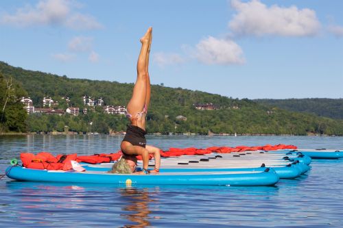 yoga on water lake woman
