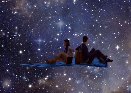 young couple stars space