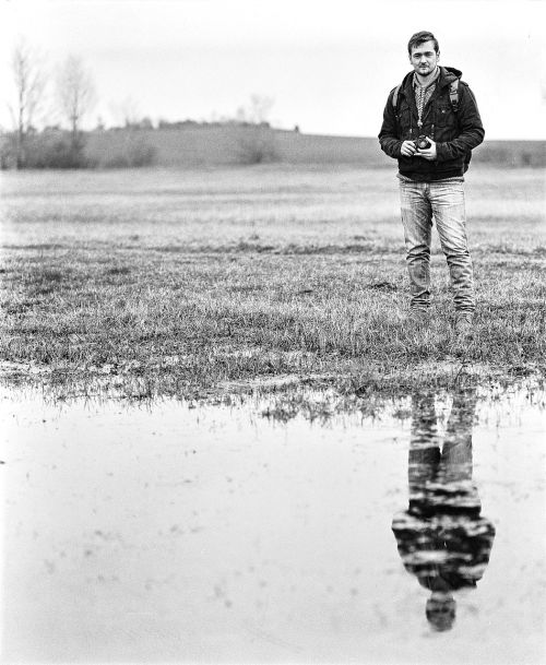 young man photographer camera