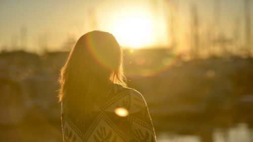 young woman sunset romantic