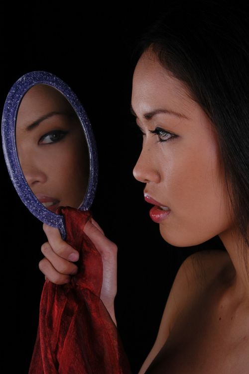 young woman beauty mirror